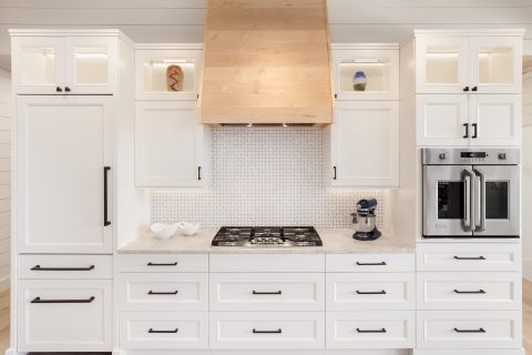 Modern kitchen cabinets showing factors that affect kitchen remodel cost.