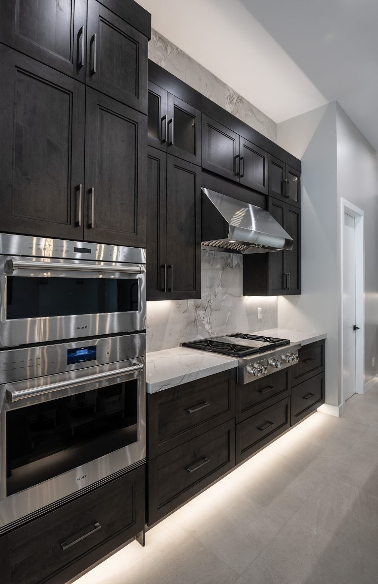 Custom cabinetry in a modern kitchen and bar space
