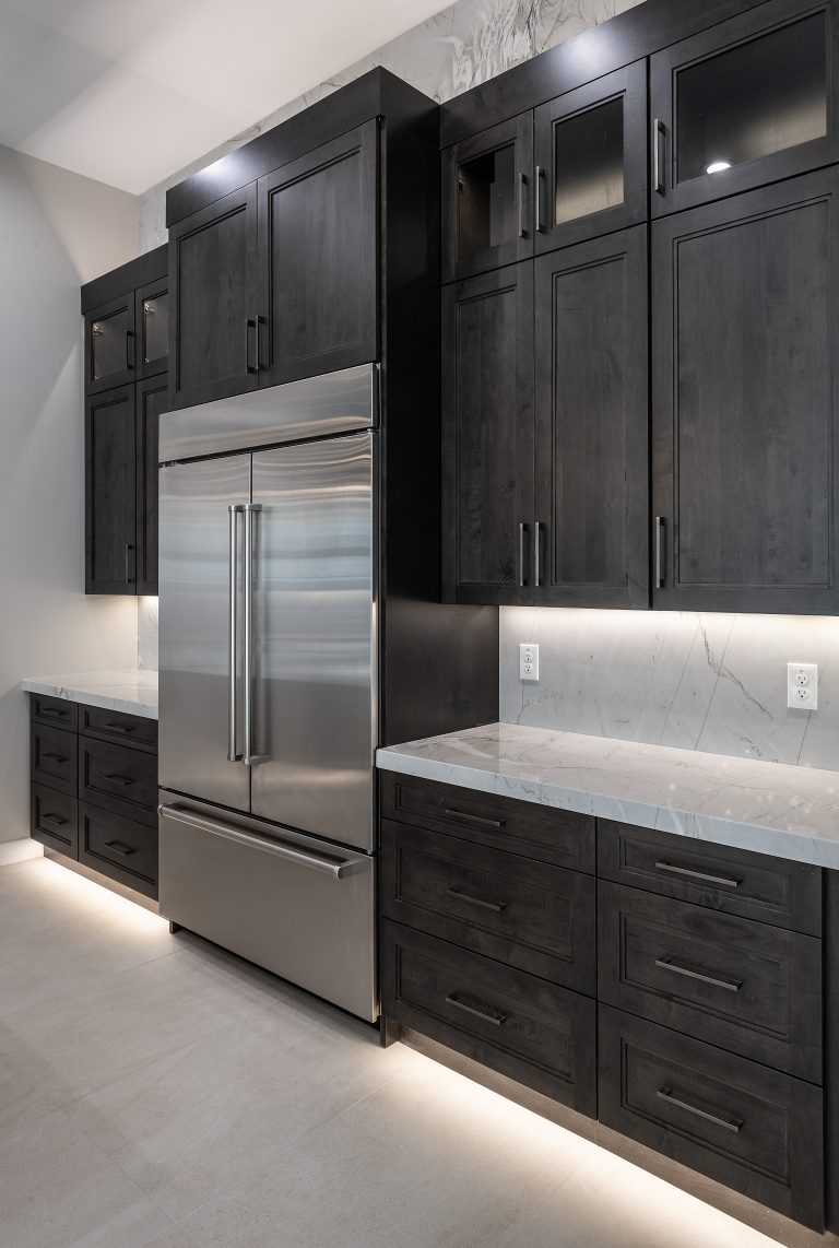 Custom cabinetry in a modern kitchen and bar space