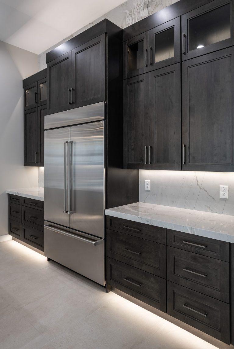 Custom cabinetry in a modern kitchen and bar space