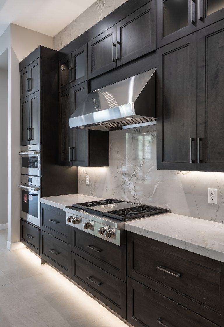Custom cabinetry in a modern kitchen and bar space