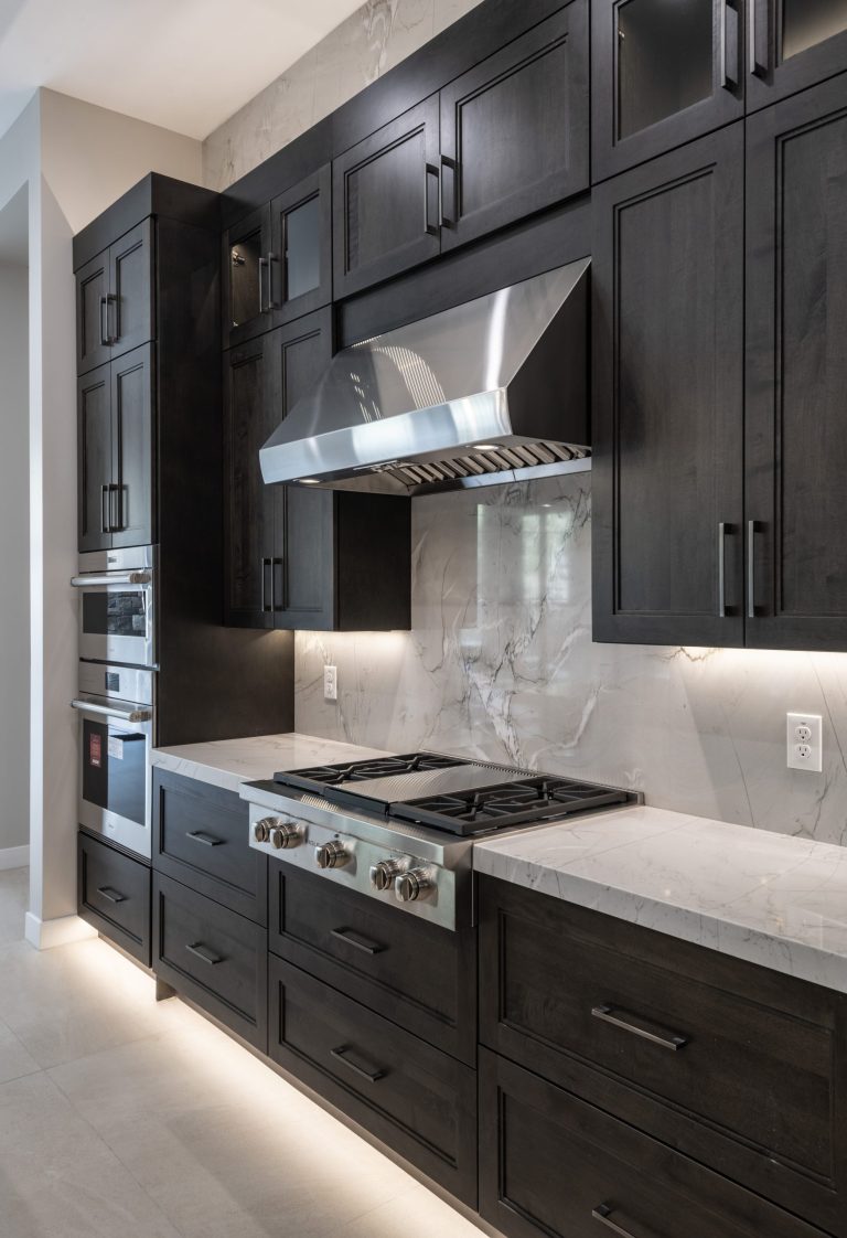 Custom cabinetry in a modern kitchen and bar space