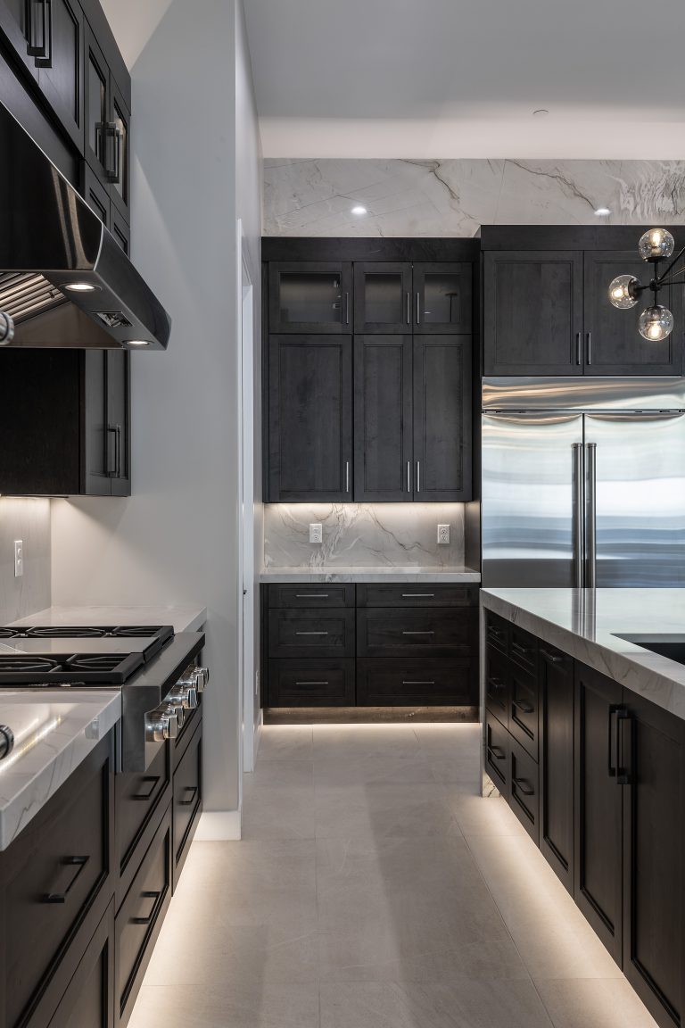 Custom cabinetry in a modern kitchen and bar space