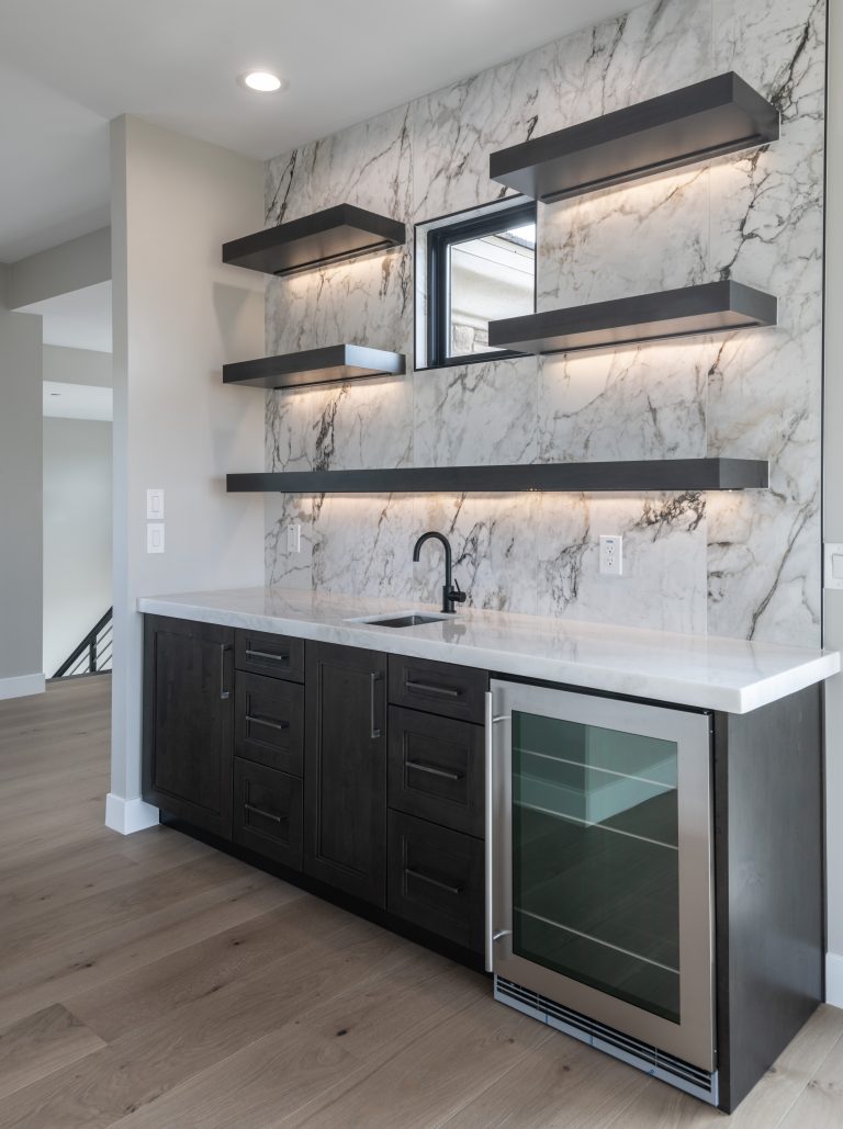Custom cabinetry in a modern kitchen and bar space