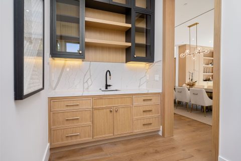 Custom wet bar cabinets with sink in modern home bar